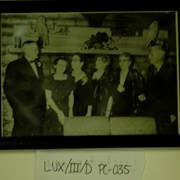Cover image of [Norman Luxton (far right) and Georgina Luxton (3rd right) with unidentified man and 3 women]